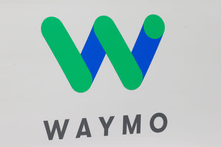 FILE PHOTO: The Waymo logo is displayed during the company's unveil of a self-driving Chrysler Pacifica minivan during the North American International Auto Show in Detroit, Michigan, U.S., January 8, 2017. REUTERS/Brendan McDermid