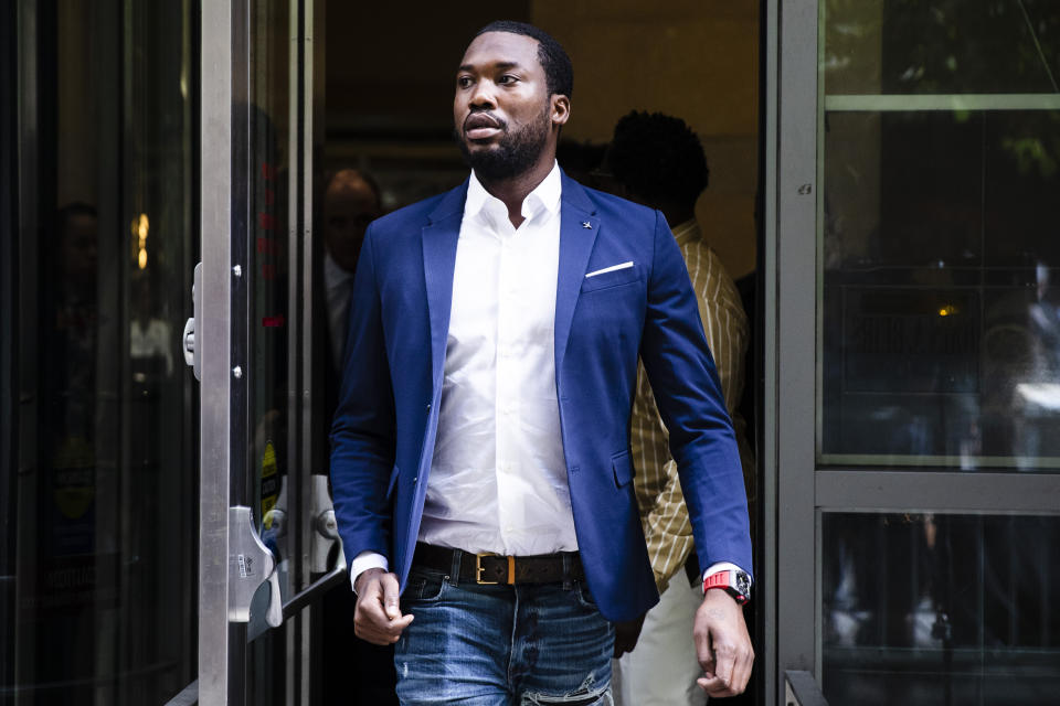 FILE - In this Aug. 6, 2019 file photo, Rapper Meek Mill departs from the criminal justice center in Philadelphia after a status hearing. Mill is due in court Tuesday to learn if Philadelphia prosecutors will drop a 2007 case that’s kept him under court supervision for more than a decade. (AP Photo/Matt Rourke, File)