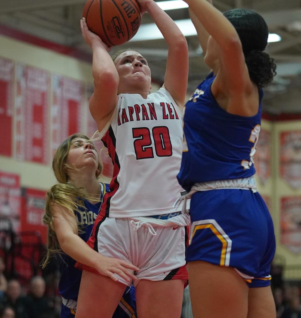 Tappan Zee's Kristen Phelan (20) works against Ardsley's Leah Burriss (30) and Joie Levy (1) during girls basketball action at Tappan Zee High School in Orangeburg on Thursday, Jan. 25, 2024.
