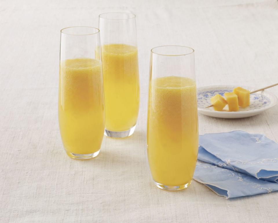 <p>This cocktail recipe is not only delicious but simple thanks to its two ingredients—mangoes and Champagne. </p><p><strong><a href="https://www.countryliving.com/food-drinks/recipes/a3640/mango-mimosa-recipe-clv0511/" rel="nofollow noopener" target="_blank" data-ylk="slk:Get the recipe for Mango Mimosa;elm:context_link;itc:0;sec:content-canvas" class="link ">Get the recipe for Mango Mimosa</a>.</strong> </p>