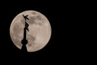 A view of the 'pink moon', or April full moon, the closest supermoon of the year, seen over Krakow. On Wednesday, April 8, 2020, in Krakow, Poland. (Photo by Artur Widak/NurPhoto via Getty Images)