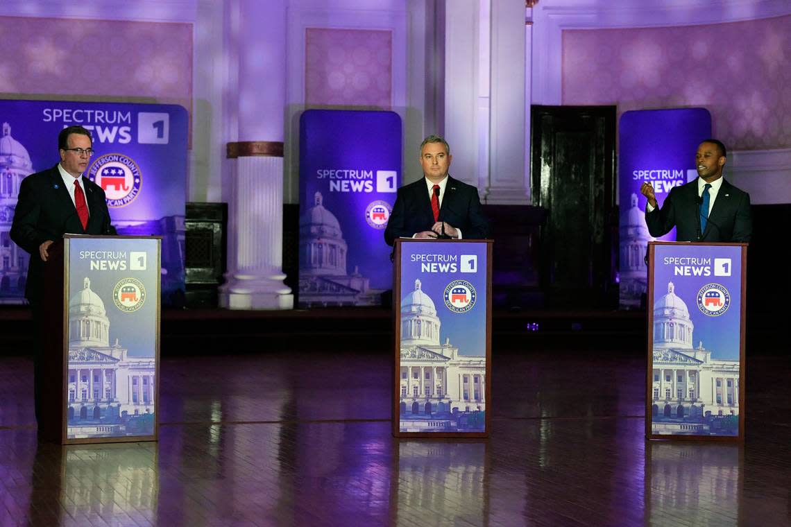 Kentucky Attorney General Daniel Cameron, right, responds to a question from the moderator as Kentucky State Auditor Mike Harmon, left, and Kentucky Agricultural Commissioner Ryan Quarles listen during the Kentucky Gubernatorial GOP Primary Debate in Louisville, Ky., Tuesday, March 7, 2023. (AP Photo/Timothy D. Easley, Pool)