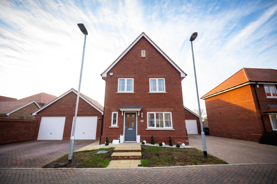 The Price family home in Maldon, Essex. A family is at war with housing developers over two lamp posts installed in the middle of the front garden of their Â£400k home.  See SWNS story SWTPlampost.  Steve Price, 41, has been at loggerheads with developers Crest Nicholson for three years in a complex legal battle.  It started when the builders installed a new lamp post on the wrong side of his front door - and demanded it be moved 5.6m to the left.  While uncovering the mistake, Steve and his wife Louise, 40, discovered they had been short changed - their lawn was 90cm shorter than it should be.  Crest Nicholson offered the family Â£15,000 compensation for the lost land, and to buy a strip of land the council now needed for lamp post maintenance.  But when Steve raised concerns about how much of his lawn would be lost to paving around the post, he claims Crest Nicholson withdrew the cash offer.  Instead the housing company said it had struck a deal with the council over the access strip.