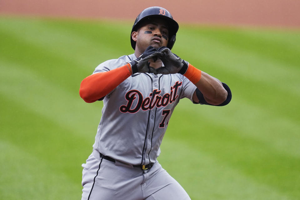 Detroit Tigers' Andy Ibáñez gestures after scoring on a home run against the Cleveland Guardians during the first inning of a baseball game Tuesday, May 7, 2024, in Cleveland. (AP Photo/Sue Ogrocki)