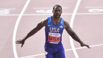 Justing Gatlin of the U.S. crosses the finish line during the men's 100 meters heats during the World Athletics Championships Friday, Sept. 27, 2019, in Doha, Qatar. (AP Photo/Martin Meissner)