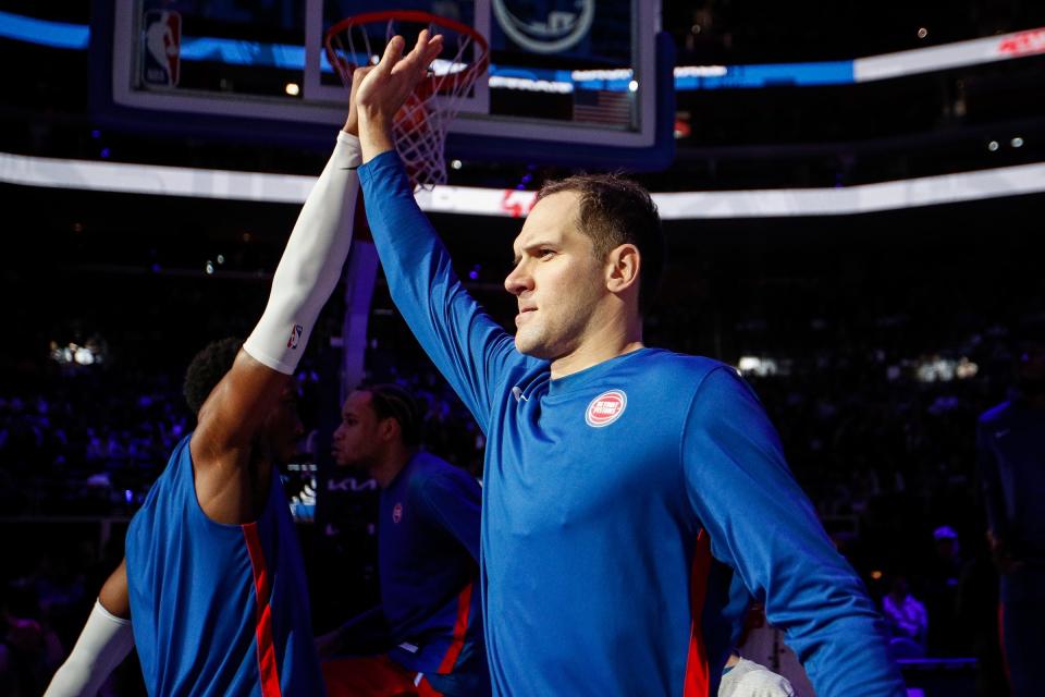 Pistons forward Bojan Bogdanovic during player introduction before tipoff against the Bucks at Little Caesars Arena, Jan. 20.