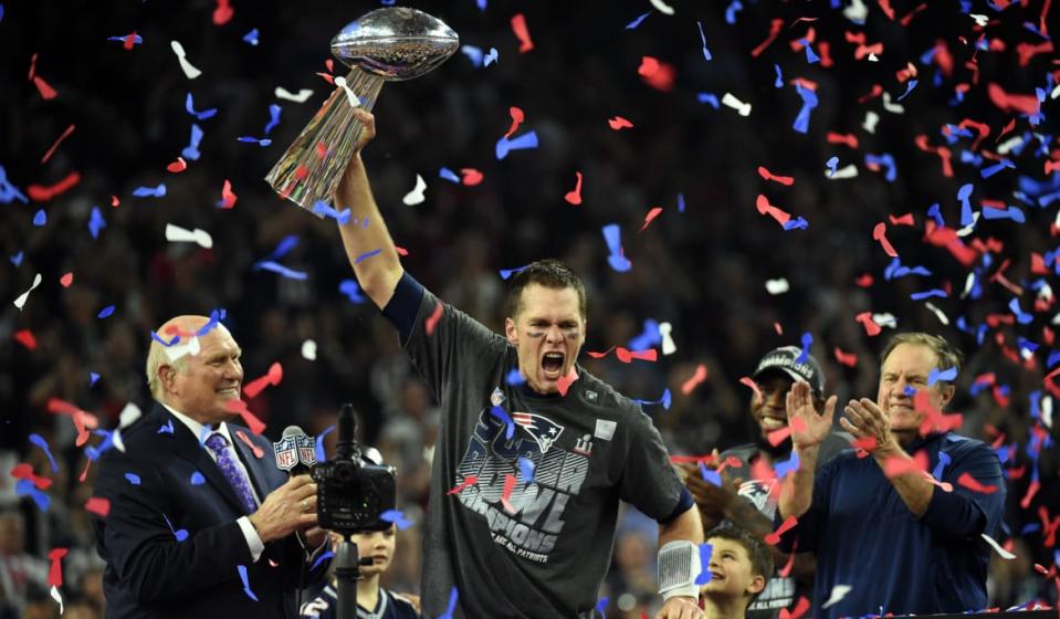 <div class="inline-image__caption"><p>Tom Brady of the New England Patriots holds the Vince Lombardi Trophy as head coach Bill Belichick looks on after defeating the Atlanta Falcons 34-28 in overtime during Super Bowl 51 at NRG Stadium on February 5, 2017, in Houston, Texas.</p></div> <div class="inline-image__credit">Timothy A. Clary/AFP/Getty</div>