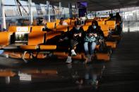 Travellers wait at Beijing Capital International Airport