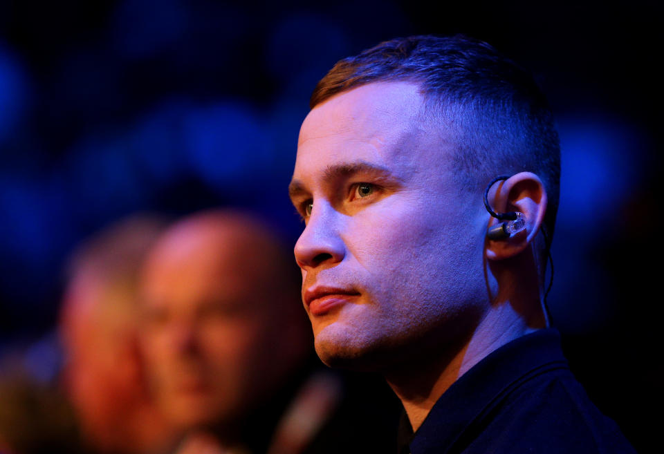 Carl Frampton is seen ringside.