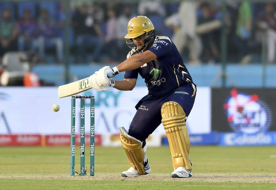 Quetta Gladiators batsman Azam Khan plays a shot during the Pakistan Super League T20 cricket match against Karachi Kings at National Stadium in Karachi, Pakistan, Sunday, Feb. 23, 2020. (AP Photo/Fareed Khan)