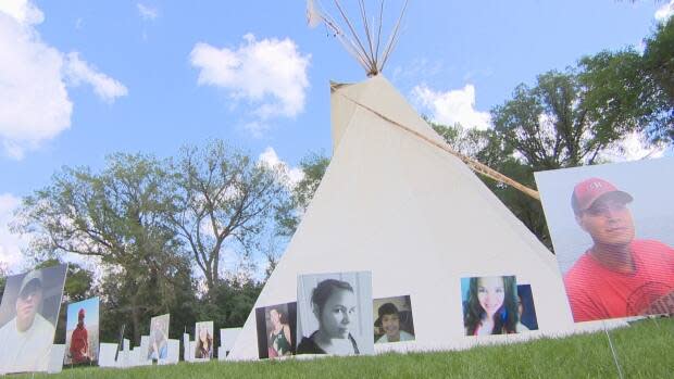 There were 89 portraits at the Walking With Our Angels protest camp of people who died by suicide. (Declan Finn/CBC - image credit)