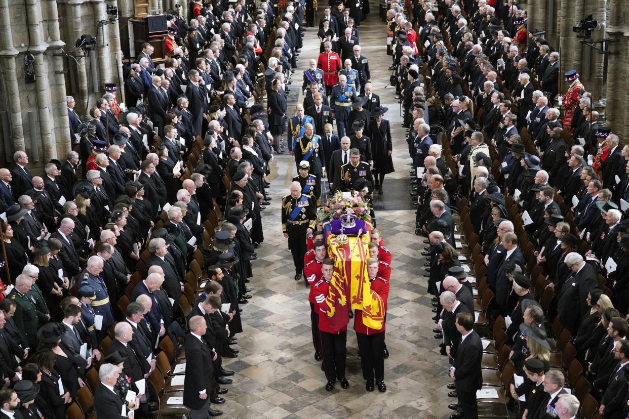 King Charles III, Camilla, the Queen Consort and members of the Royal family follow behind the coffin of Queen Elizabeth II.