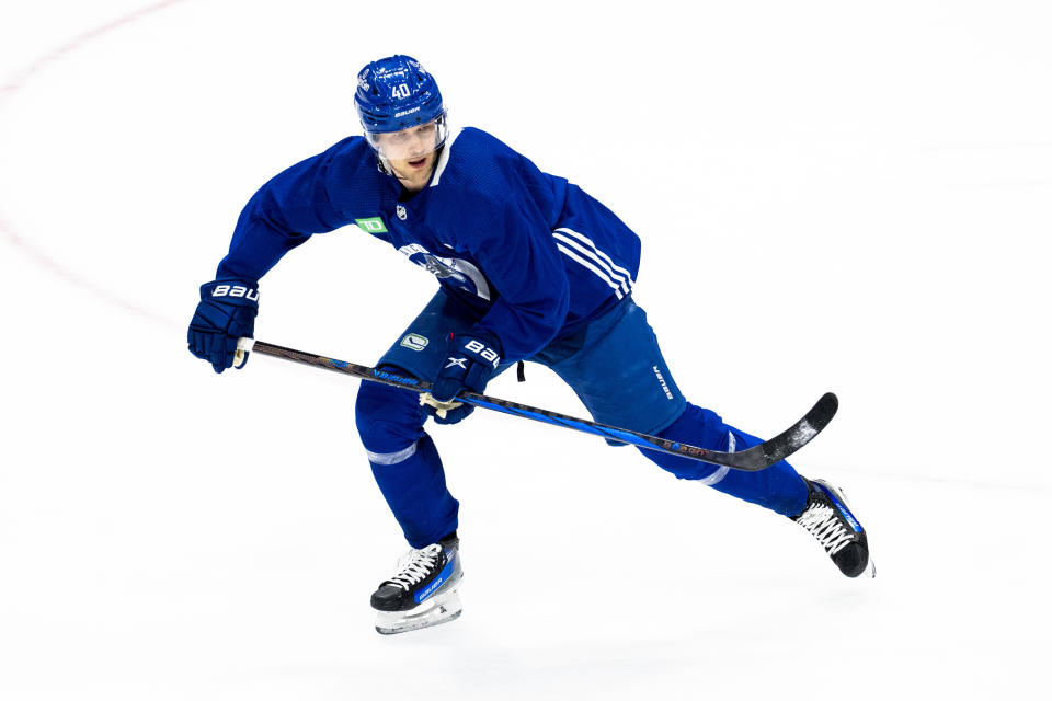 Vancouver Canucks' Elias Pettersson skates during an NHL hockey practice in Vancouver, British Columbia on Saturday, March 2, 2024. Pettersson resigned to the team with an eight year contract extension. (Ethan Cairns/The Canadian Press via AP)