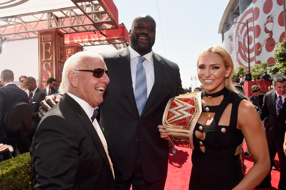 <p>(L-R) WWE wrestler Ric Flair, former NBA player Shaquille O’Neal and WWE Diva Charlotte attend the 2016 ESPYS at Microsoft Theater on July 13, 2016 in Los Angeles, California. (Photo by Kevin Mazur/Getty Images) </p>