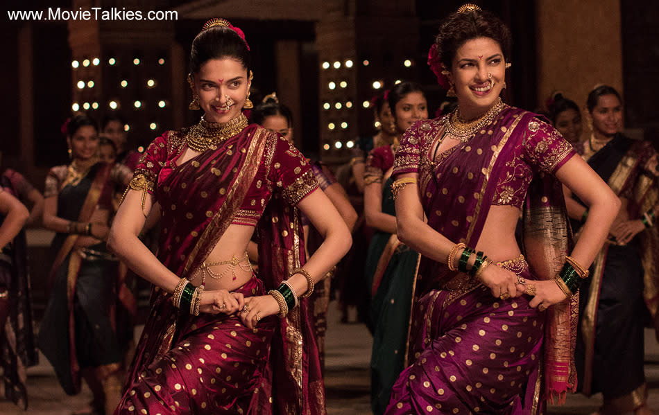 Bajirao Mastani Deepika and Priyanka’s Pinga in Bajirao Mastani had the dimpled diva flaunt a maroon marathi Nauvari style. She accentuated the sari with heavy jewellery,  payal and oh-so-perfect bun. We just can’t get enough of her in this number!