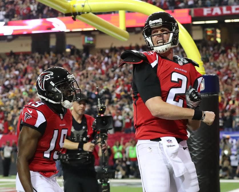 Falcons quarterback Matt Ryan reacts to scoring a touchdown on a quarterback keeper in the first half of the NFC Championship Game against the Green Bay Packers Sunday, Jan. 22, 2017, in Atlanta.