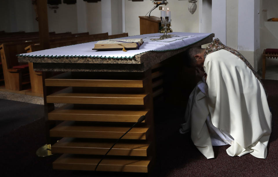 Roman Catholic priest Michal Lajcha serves a mass in a church in Klak, Slovakia, Monday, Sept. 17, 2018. Lajcha is challenging the Roman Catholic Church’s celibacy rules in a rare instance of dissent in the conservative religious stronghold in central and eastern Europe. (AP Photo/Petr David Josek)