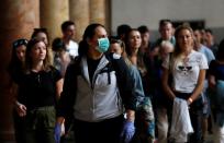 A tourist wearing a mask as a preventive measure against the coronavirus visits the Church of the Nativity in Bethlehem in the Israeli-occupied West Bank