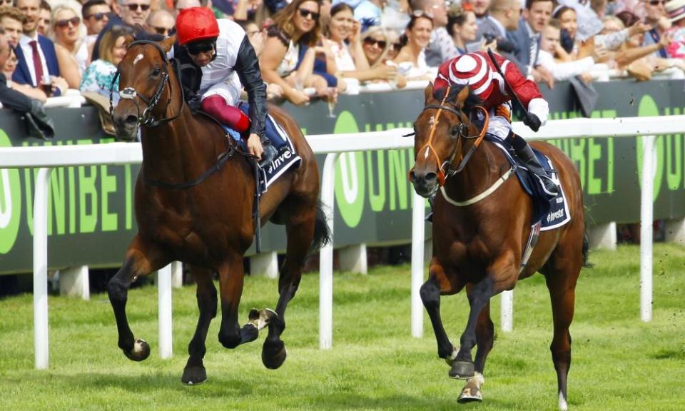 Cracksman and Frankie Dettori (left) just stay ahead of Salouen in the Coronation Cup at Epsom on 1 June.
