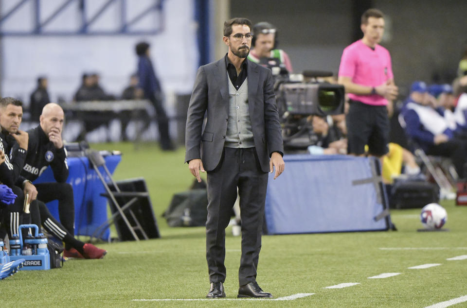 CF Montreal head coach Hernan Losada looks on from the sideline during second-half MLS soccer match action against the Philadelphia Union in Montreal, Saturday, March 18, 2023. (Graham Hughes/The Canadian Press via AP)