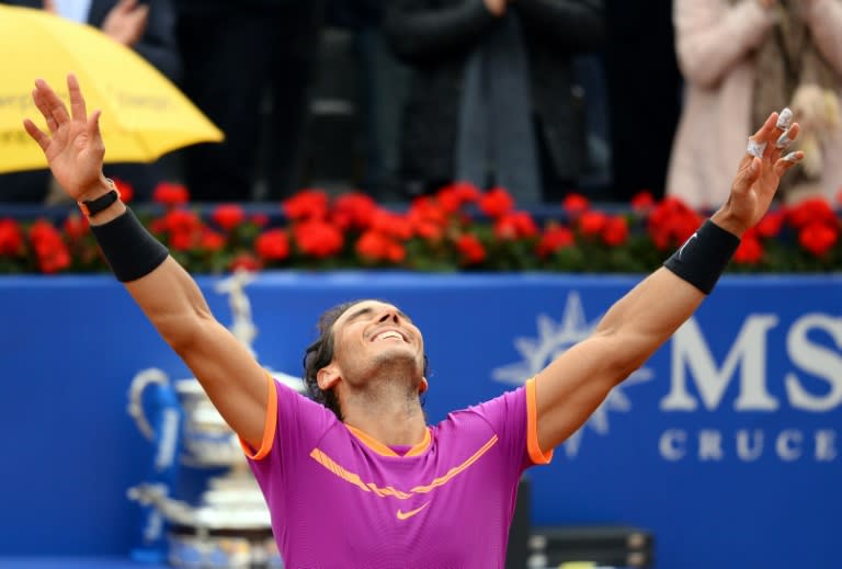 Spanish tennis player Rafael Nadal celebrates his victory over Austrian tennis player Dominic Thiem at the end of the ATP Barcelona Open on April 30, 2017