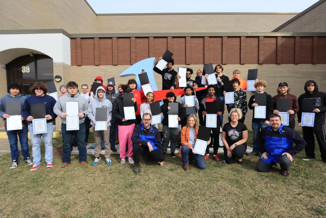 Students in the Welding Career Tech Program at Alliance High School celebrate after receiving news that 100% of the class passed the certification test. Every student in the senior class is an American Welding Society-certified welder with at least one certification.