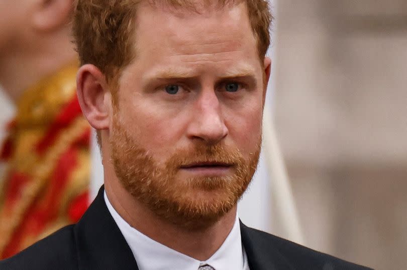 Prince Harry at the crowning of his father