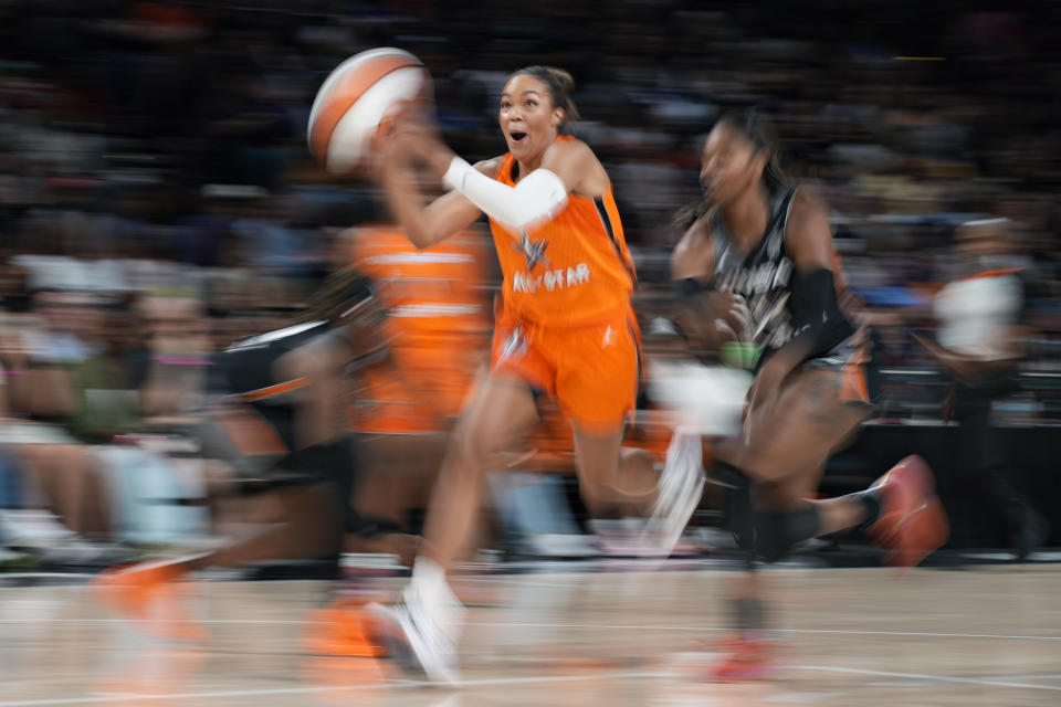 Minnesota Lynx's Napheesa Collier, of Team Stewart, drives towards the basket against Team Wilson during the second half of a WNBA All-Star basketball game Saturday, July 15, 2023, in Las Vegas. (AP Photo/John Locher)