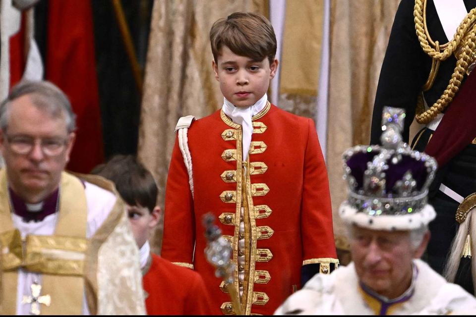 <p>Getty Images</p> Prince George at King Charles