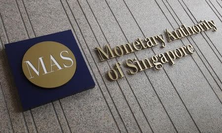 The logo of the Monetary Authority of Singapore (MAS) is pictured at its building in Singapore in this February 21, 2013 file photo. REUTERS/Edgar Su/Files