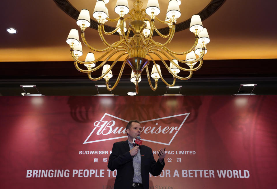 Jan Craps, Executive Director and CEO of Budweiser Brewing Company APAC Limited speaks during a press conference in Hong Kong Tuesday, Sept. 17, 2019. AB InBev, the world's largest brewer that produces Budweiser and Corona, has revived plans to list its Asian business in Hong Kong despite persistent pro-democracy protests but halved the size of its initial public offering. (AP Photo/Vincent Yu)