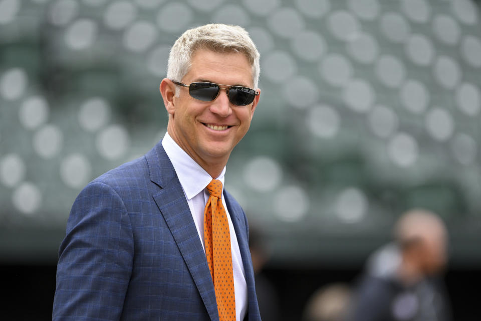 FILE - Baltimore Orioles executive vice president and general manager Mike Elias smiles during batting practice before an opening day baseball game against the New York Yankees, Friday, April 7, 2023, in Baltimore. Elias was voted Major League Baseball's Executive of the Year on Tuesday, Nov. 7, after the team finished with the American League's best record for the first time since 1997. (AP Photo/Terrance Williams, File)