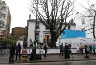 FILE PHOTO: Members of the media wait outside the Abbey Road recording studios in London