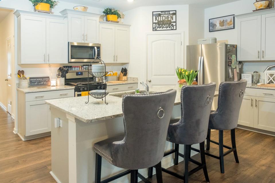 The kitchen is bright and beautiful with plenty of work space and storage.