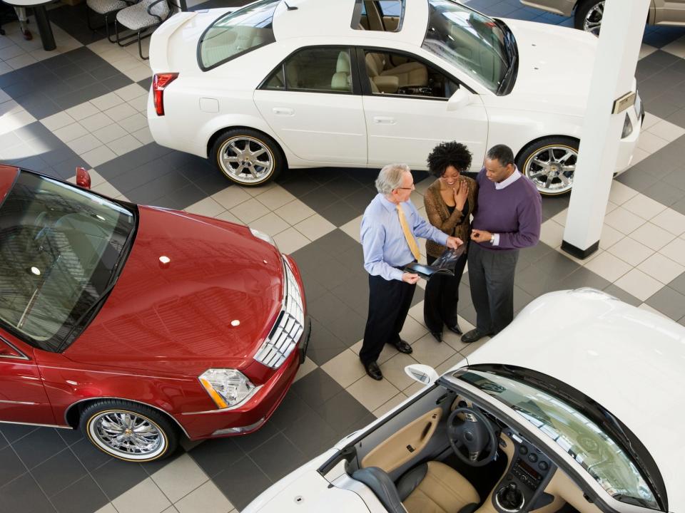 couple buying a car