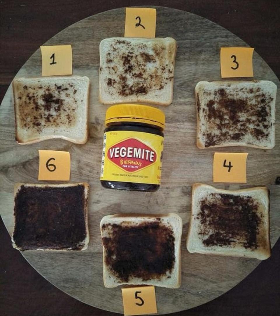 A photo of Vegemite spread on six slices of toast