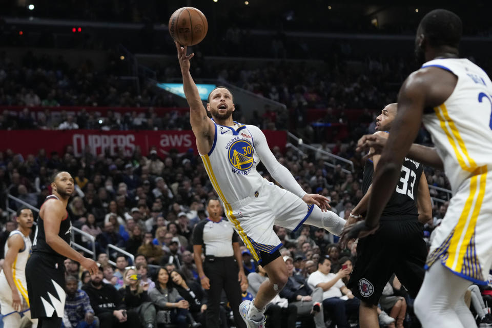 Golden State Warriors' Stephen Curry shoots during the second half of the team's NBA basketball game against the Los Angeles Clippers on Wednesday, March 15, 2023, in Los Angeles. The Clippers won 134-126. (AP Photo/Jae C. Hong)