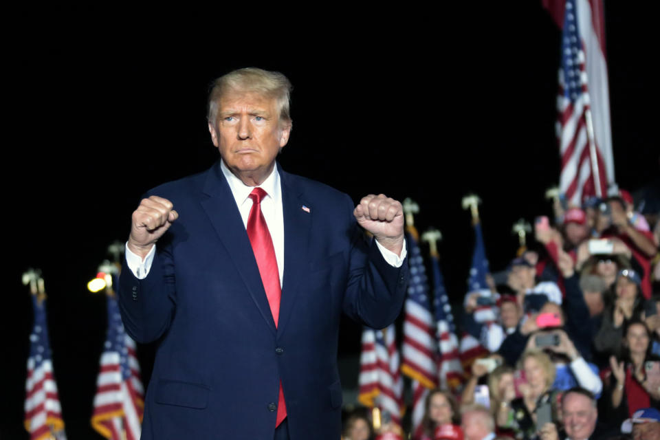 Former President Donald Trump gestures as he holds a rally Friday, Sept. 23, 2022, in Wilmington, N.C. (AP Photo/Chris Seward)