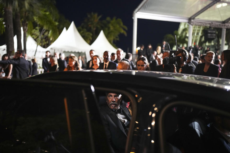 Kevin Costner departs the premiere of the film 'Horizon: An American Saga' at the 77th international film festival, Cannes, southern France, Sunday, May 19, 2024. (Photo by Daniel Cole/Invision/AP)