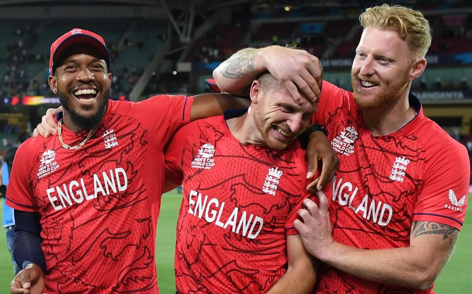Chris Jordan, Jos Buttler and Ben Stokes of England celebrate victory following the T20 World Cup Semi Final against India at Adelaide Oval on November 10, 2022
