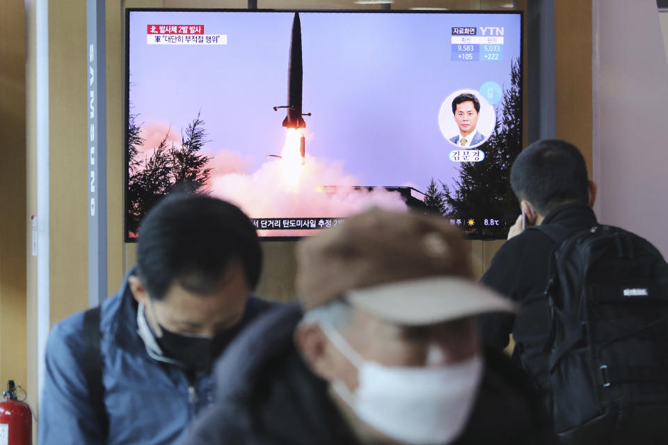 A TV screen shows a file image of North Korea's missile launch during a news program at the Seoul Railway Station in Seoul, South Korea, Sunday, March 29, 2020. North Korea on Sunday fired two suspected ballistic missiles into the sea, South Korea said, calling it "very inappropriate" at a time when the world is battling the coronavirus pandemic. (AP Photo/Ahn Young-joon)