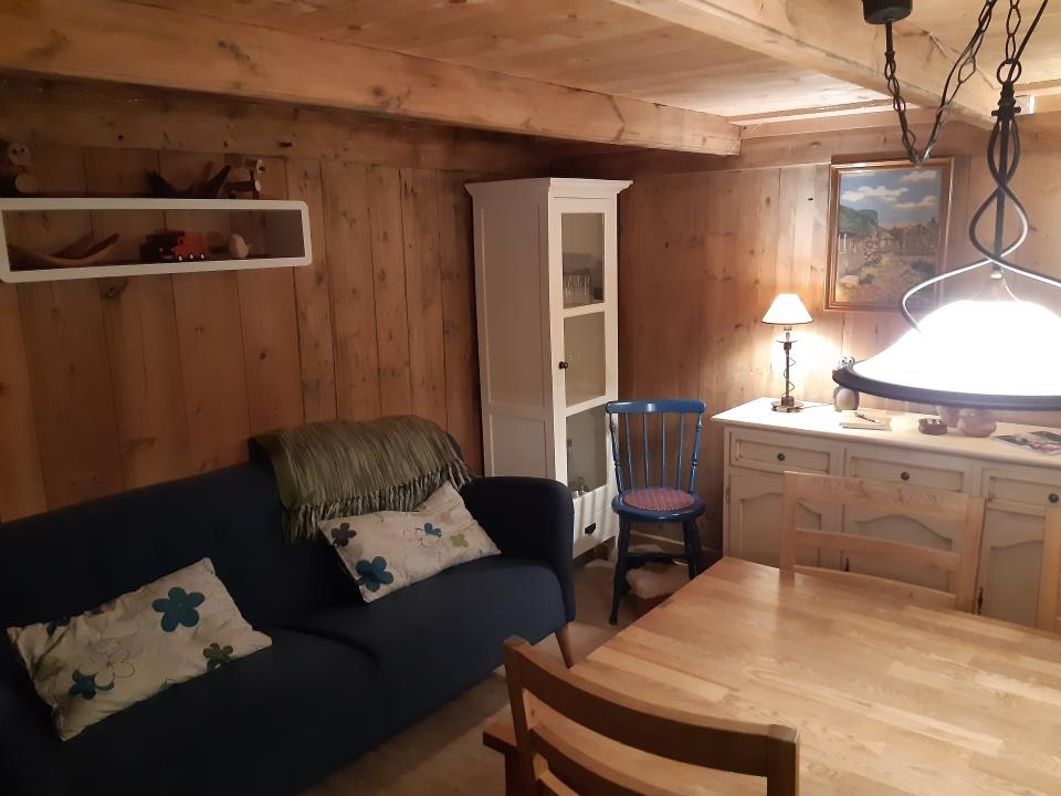 Tiny home living room area with couch and counter