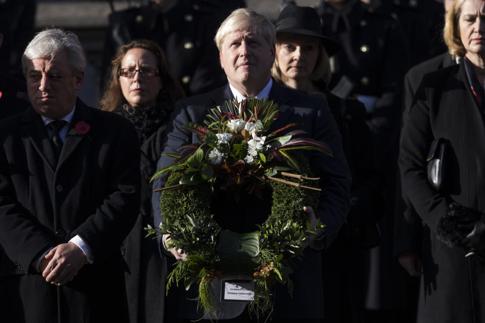 LONDON, ENGLAND - NOVEMBER 13: Foreign Secretary Boris Johnson (C) attends the annual Remembrance Sunday Service at the Cenotaph on Whitehall on November 13, 2016 in London, England. The Queen, senior politicians, including the British Prime Minister and representatives from the armed forces pay tribute to those who have suffered or died at war. (Photo by Jack Taylor/Getty Images)