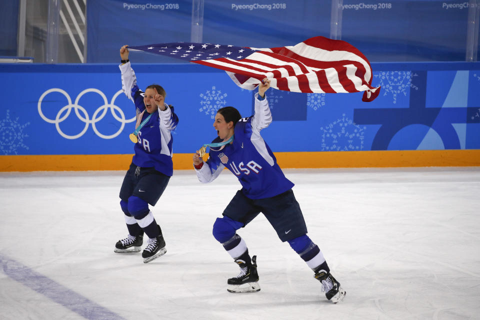 American women Kendall Coyne, left, and Hilary Knight celebrate after winning the women’s gold medal hockey game against Canada. Coyne is engaged to Chargers’ tackle Michael Schofield. (AP)