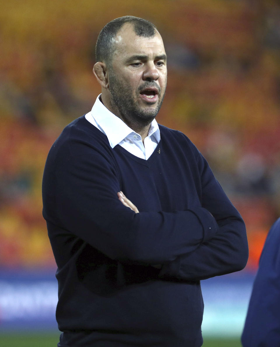 Australia's coach Michael Cheika stands prior to a Rugby Championship match between Australia and Argentina in Brisbane, Australia, Saturday, July 27, 2019. (AP Photo/Tertius Pickard)