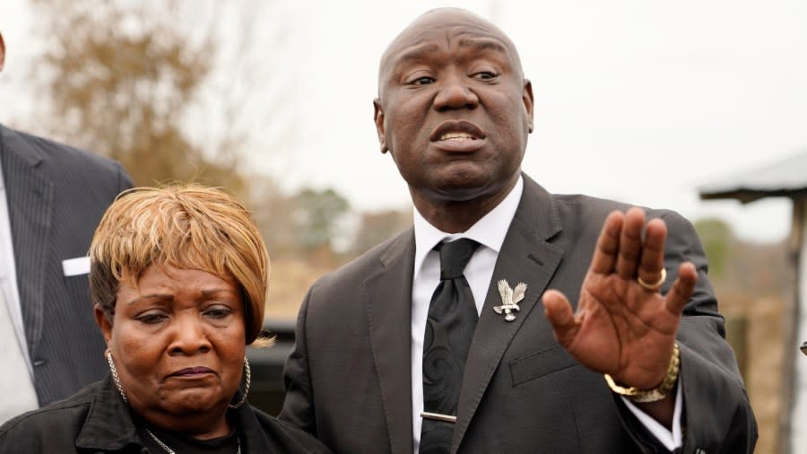 Civil rights attorney Ben Crump, (right) stands with Bettersten Wade, mother of Dexter Wade, a 37-year-old man who died after being hit by a Jackson, Mississippi police SUV driven by an off-duty officer, as he tells reporters Monday at the Hinds County Penal Farm that he is asking for a federal investigation as to why authorities waited several months to notify the family of Wade’s death. (Photo: Rogelio V. Solis/AP)