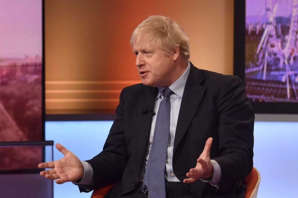 Mr Johnson took a seat in the Andrew Marr show on Sunday but failed to committ to speaking to Andrew Neil (PA)