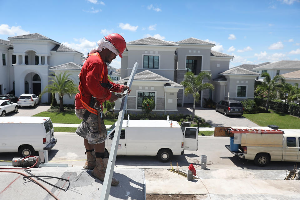 BOCA RATON, FL - AUGUST 21:  Diego Perez works on a Toll Brothers home on August 21, 2018 in Boca Raton, Florida. Toll Brothers topped Wall Street estimates for quarterly profit, with net income rising to $193.3 million or $1.26 per share up from $148.6 million or 87 cents per share a year earlier. Revenue rose 27.3 percent to $1.91 billion  (Photo by Joe Raedle/Getty Images)