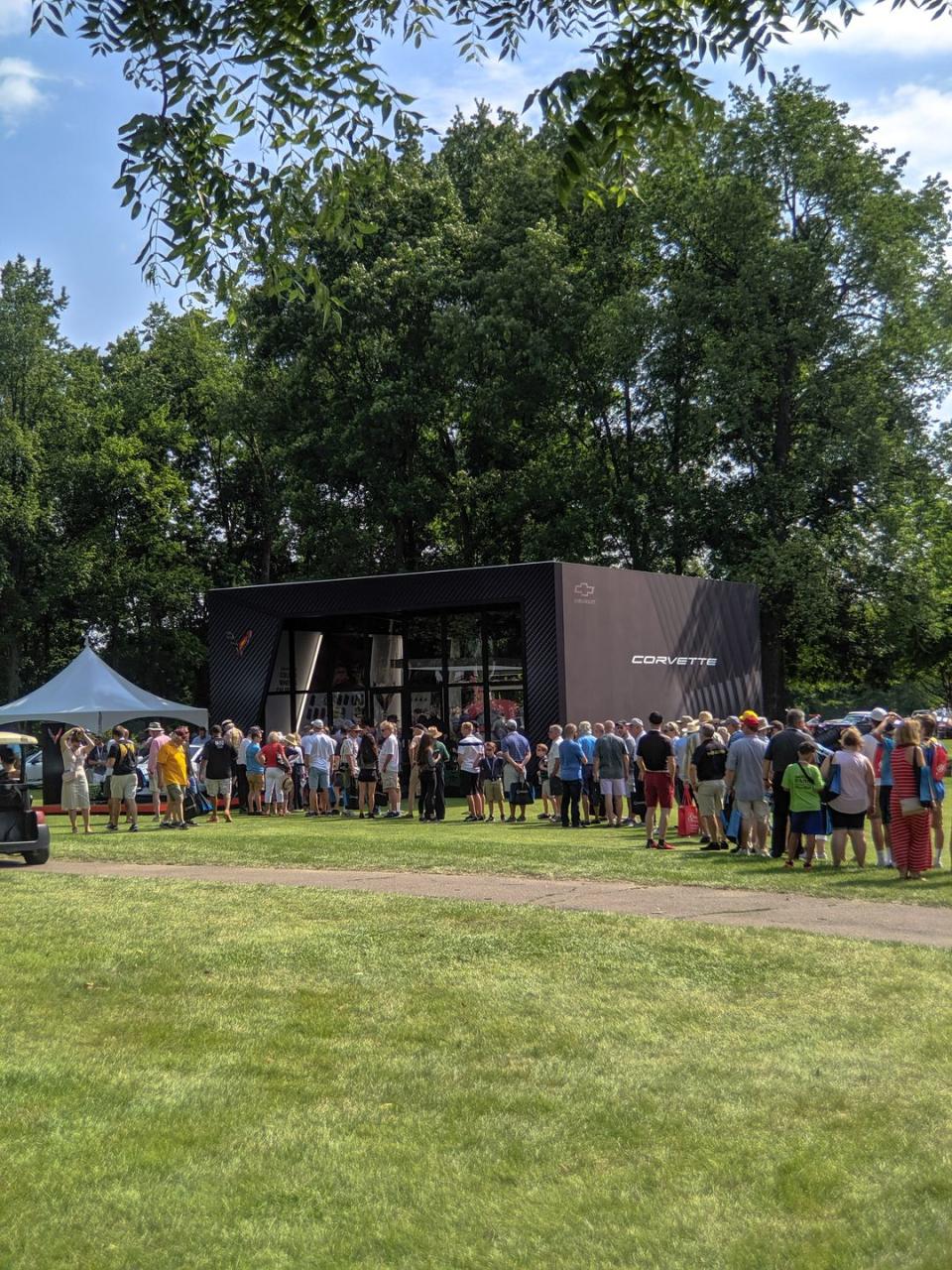 <p>Once the concours was open to the public, the line to go inside the Corvette building was super long all day.</p>