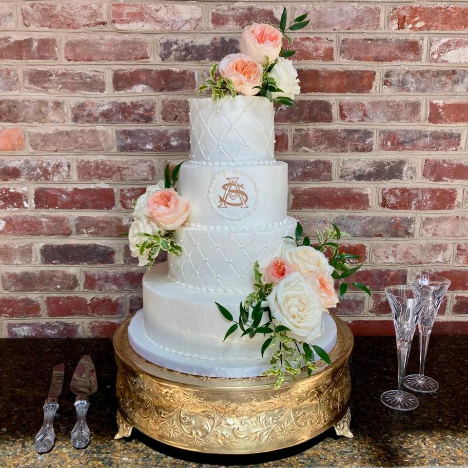 A custom three-tier wedding cake made by Tinker’s Cake Shop at 317 W. Maxwell St. in Lexington, Ky.